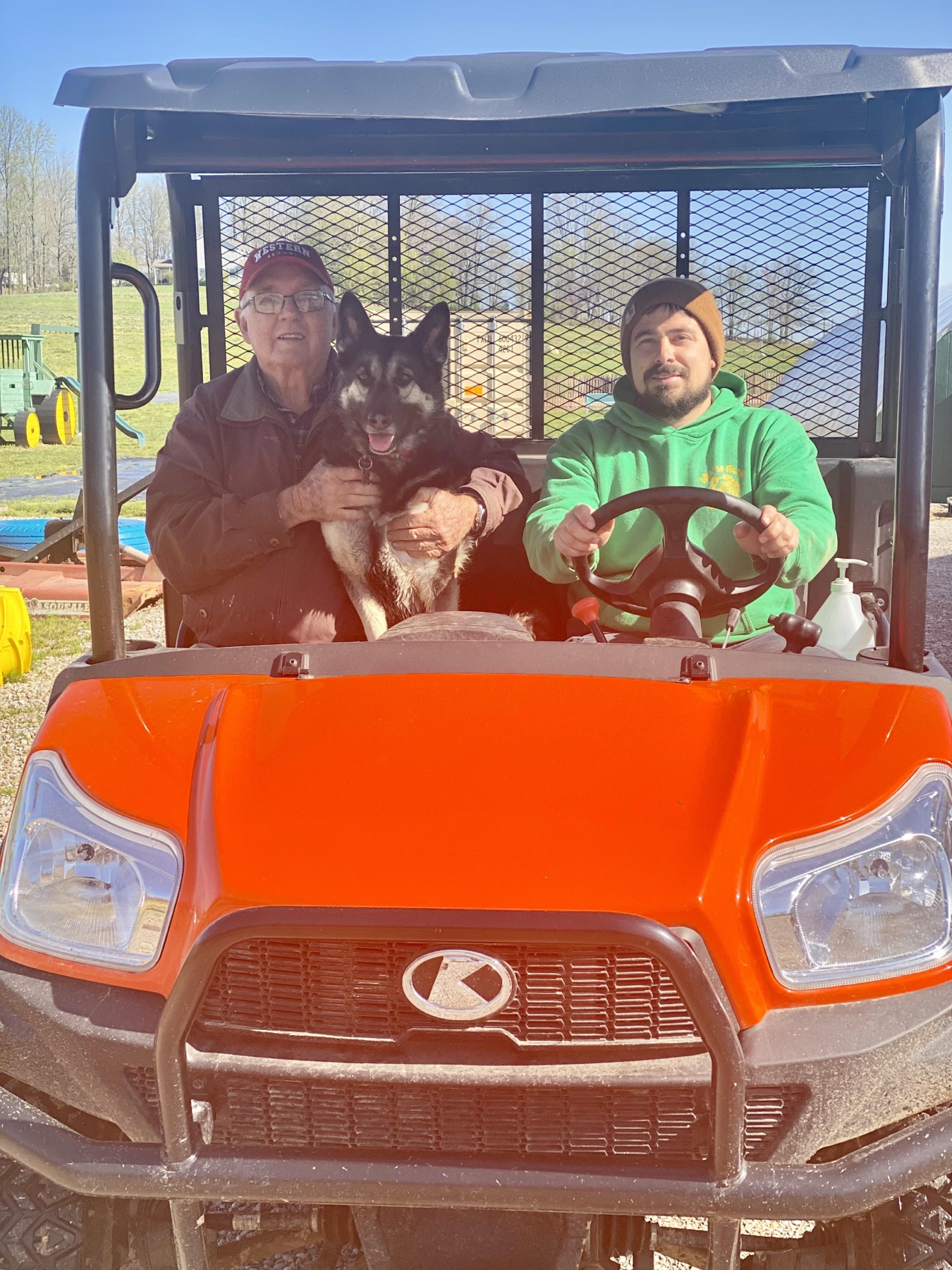 Papa, Libby, and Tyler on a farm mule